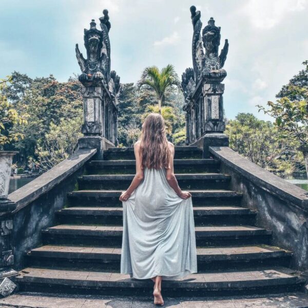 Couple enjoying scenic view from a private Bali swing